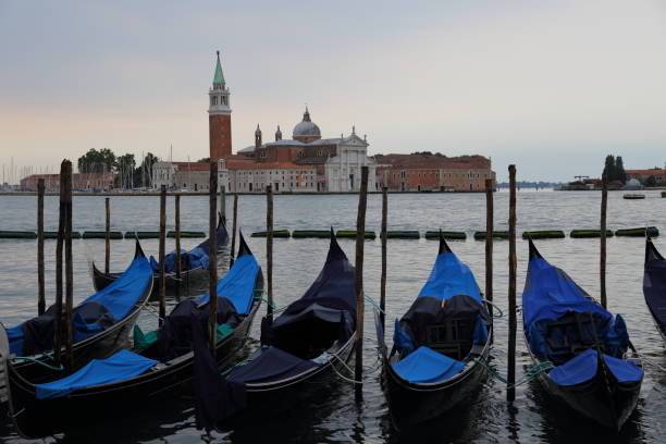 istock Gondolas and Chiesa di San Giorgio Maggiore, 813504906