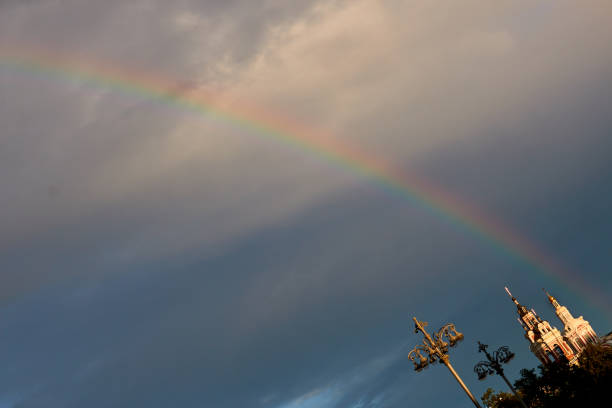 istock a rainbow over the city. 813504922