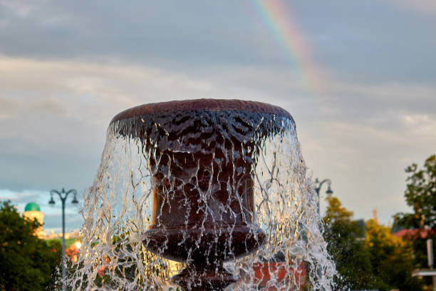 istock a rainbow over the city. 813504928