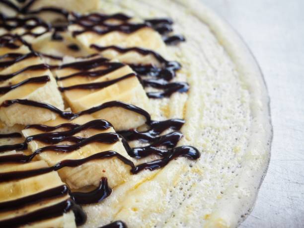 istock Crepe and banana with chocolate sauce 813510656
