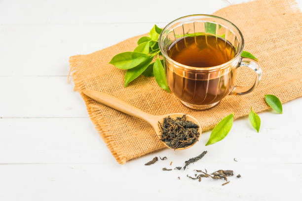 istock tea with  Tea glass on white wood 813520454
