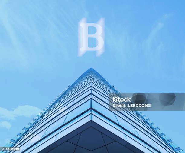 Skyscraper Pyramid Built With Virtual Money Concept Stock Photo - Download Image Now