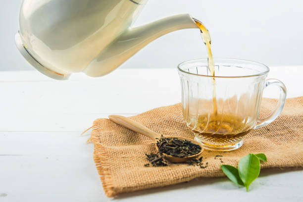 istock tea with  Tea glass on white wood 813533178