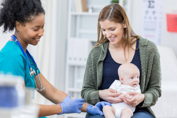 istock Pediatric nurse gives baby an immunization 813537966