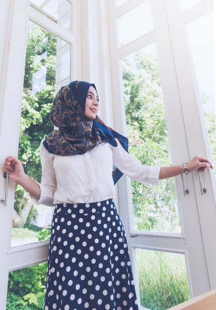 istock Portrait Muslim woman standing. 813554020