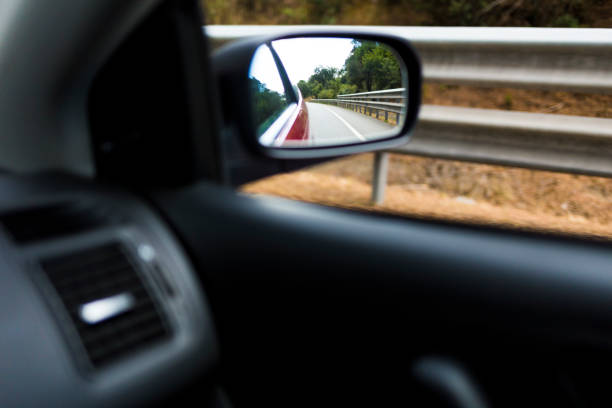 istock Right mirror car on the road 813559222