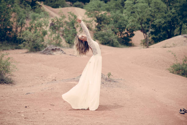 istock Beautiful bride dancing outdoor 813559928