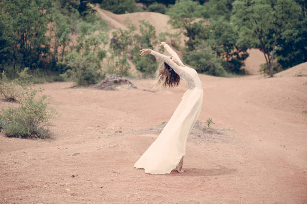 istock Beautiful bride dancing outdoor 813559932
