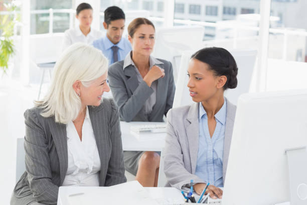 istock Businesswoman checking her colleagues works 813560174