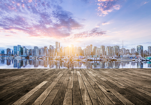 vancouver city downtown skyline with wooden floor on foreground.