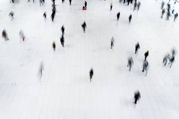 istock Motion blur of people moving along 813568206
