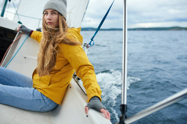 istock Woman sailing the boat 813569928
