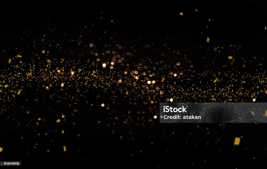 Waving golden glitter and confetti Gold - Metal Stock Photo