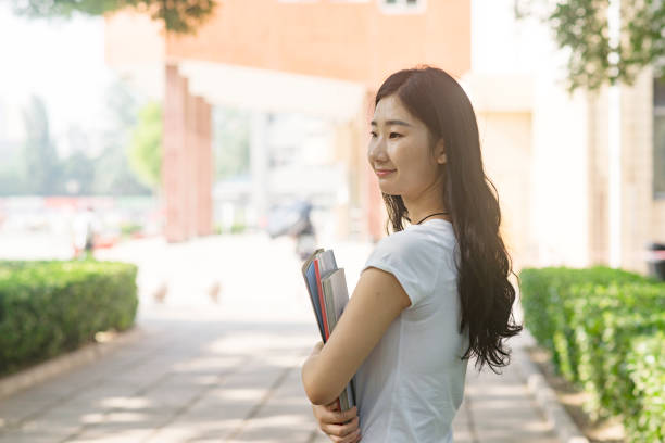 istock female asian college student on campus 813578866
