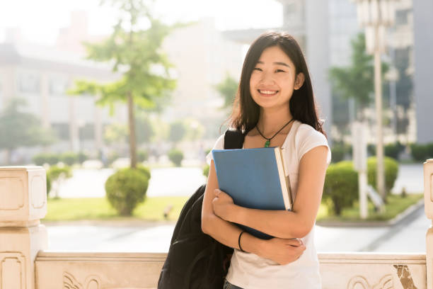 istock smart female college student on campus 813580472