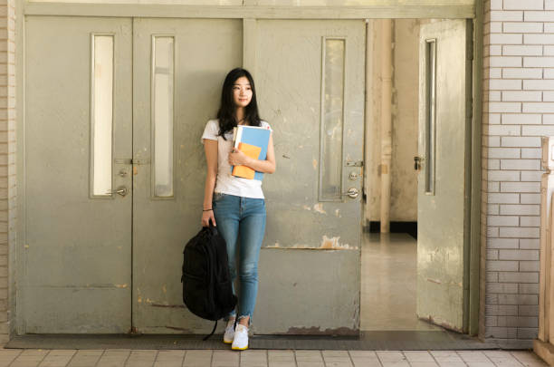 istock Female college student on campus 813580542
