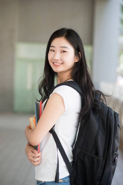 istock female asian college student on campus 813580558