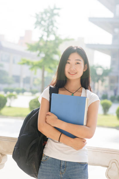istock smart female college student on campus 813580570