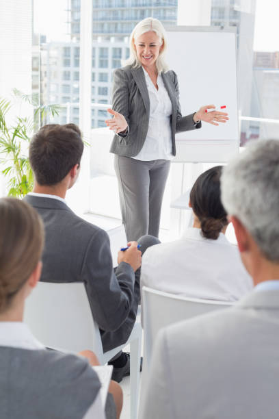 istock Businesswoman doing speech during meeting 813590914