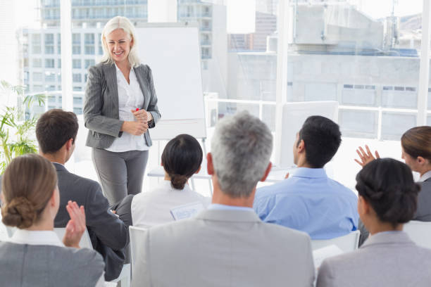 istock Businesswoman doing speech during meeting 813590948