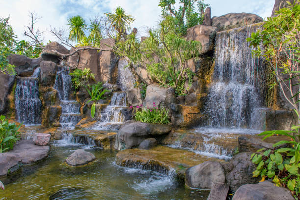 istock Waterfall in garden at the public park 813591062