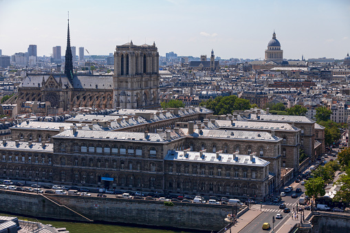 Paris, France - July 07 2017: Aerial view of the Hôpital Hôtel-Dieu (AP-HP), the Pont Notre-Dame and the Seine River and with behind, Notre Dame, the Panthéon, the Église Saint-Étienne-du-Mont, the Lycée Henri IV and the Église du Val-de-Grâce.