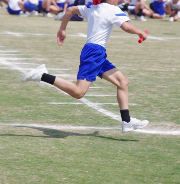istock relay race at a sports day 813601080