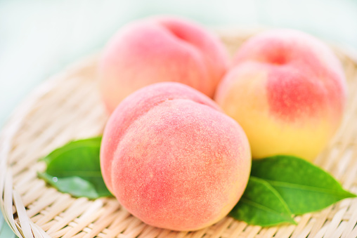 Fresh Organic Peaches on Japanese Zaru