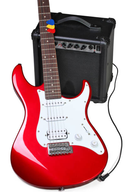istock Electric guitar and amplifier isolated on a white 813607022