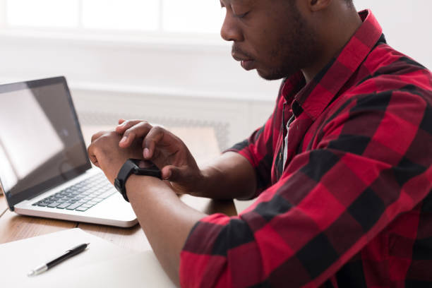 istock Black businessman in casual office, work with laptop 813625888