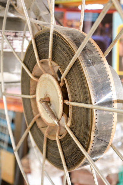 istock Ancient movie projector film wheel brown old clssic 813637514