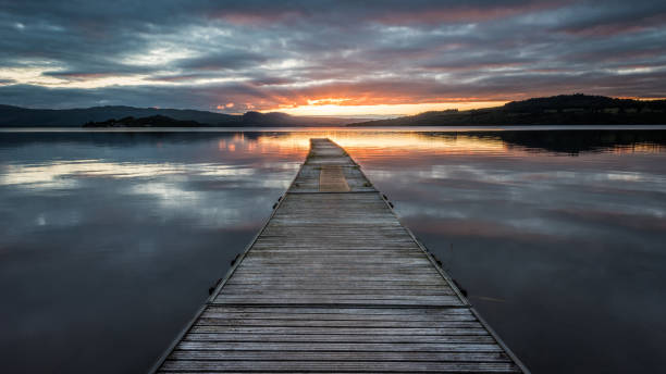 istock First Rays of Light on Loch Lomond 813640944