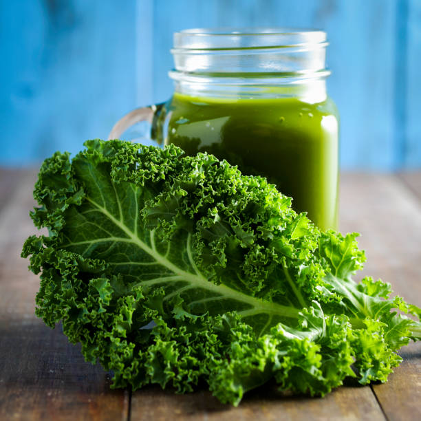 istock kale smoothie in a mason jar 813641184