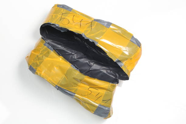 istock New women's black shoes opening a parcel 813641374