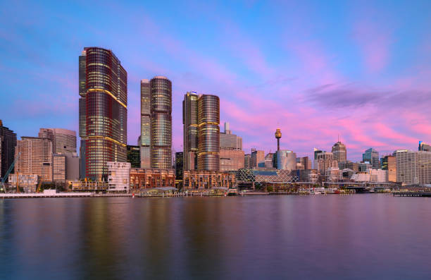 Sydney, Darling Harbour on sunset. SYDNEY, AUSTRALIA - July 11, 2017 : Sydney, Darling Harbour on sunset, adjacent to the city center of Sydney and also a recreational place in Sydney central business district gloriole stock pictures, royalty-free photos & images