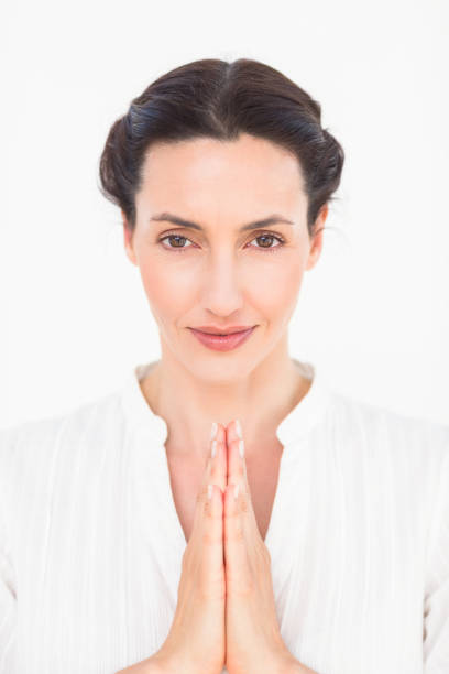 istock A woman in a meditation position 813662330