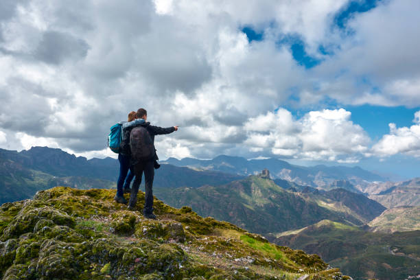 istock together on top of the mountains 813672672