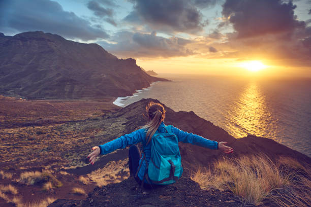 istock the best way to relax on a mountain peak a watch a sunset 813676578