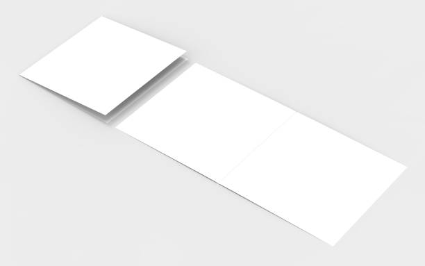 istock Square bi-fold brochure mock up isolated on soft gray background. 3D illustrating. 813702746
