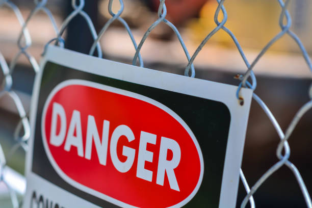 istock Danger sign on a fence 813713266