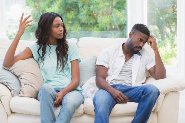 istock Couple having argument on the couch 813714136