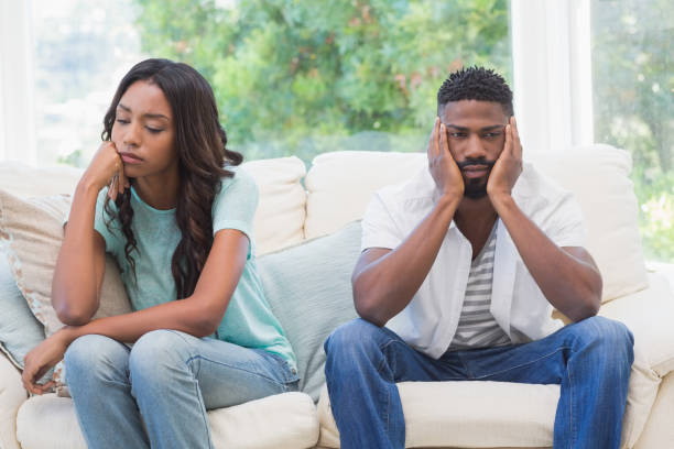 istock Couple having argument on the couch 813714304