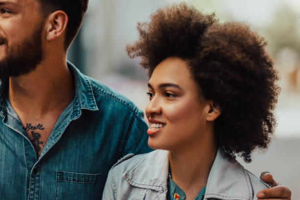 istock Charming african girl with her boyfriend 813716650