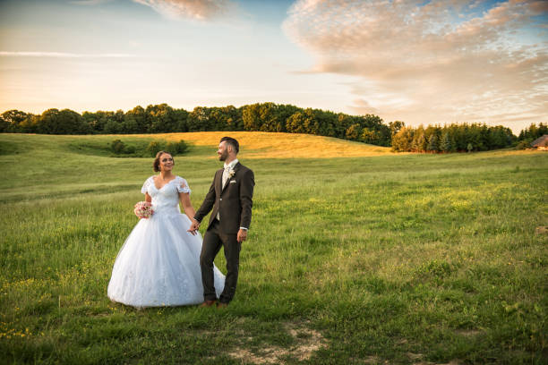 istock Wedding couple on nature. 813717186