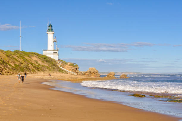 Point Lonsdale, Victoria, Australia - April 8, 2012: Autumn afternoon stroll on the beach at the Point Lonsdale Lighthouse