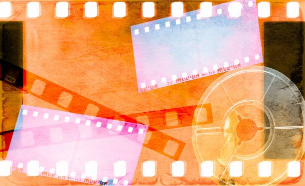 istock Grunge colorful film strip frame with coil. 813729586
