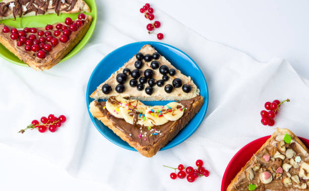 istock Sandwiches with fruit and sweet cream 813732016