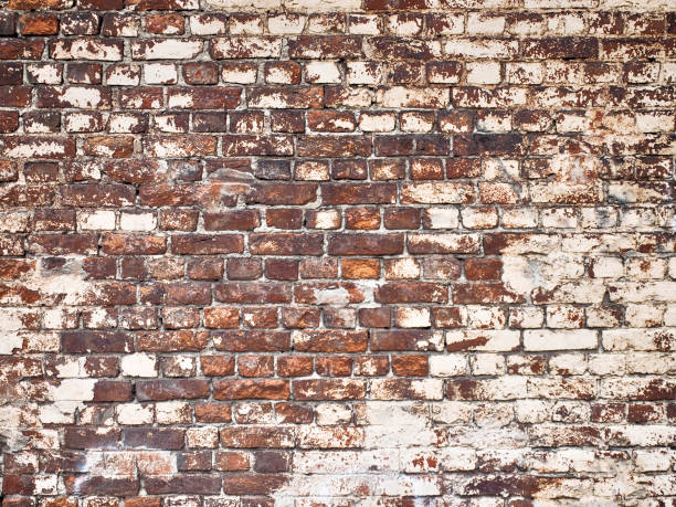 istock texture of a brick wall as background, grunge surface with a vintage effect 813732606