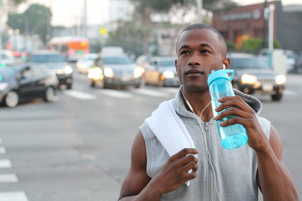 istock African American Sport man drinking water 813739612