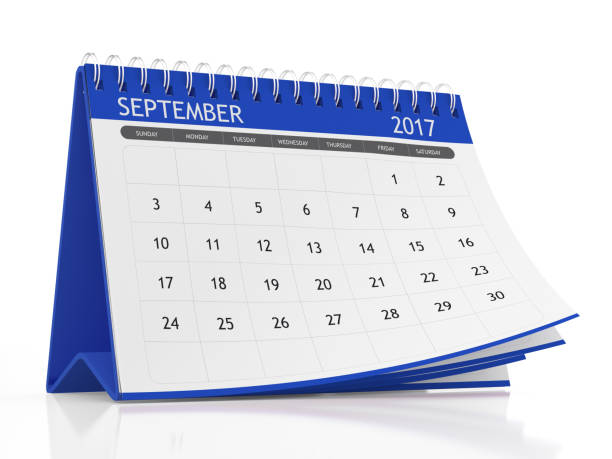 istock September 2017 Desktop Calendar with Blue Plastic on White Background 813744106